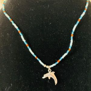 Super cute!  Beads with silver dolphin! 🐬